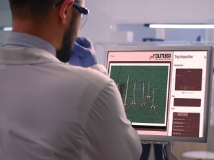 Scientist working in laboratory analysing test trial vaccine checking drug data standing in front of pc. Group of chemists examining virus evolution using high tech for research diagnosis